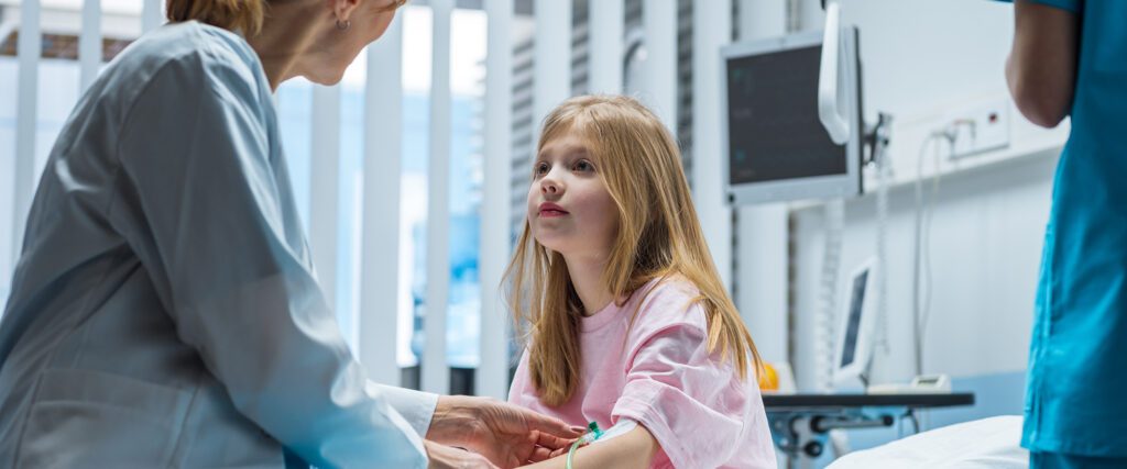 Nurse with pediatric patient
